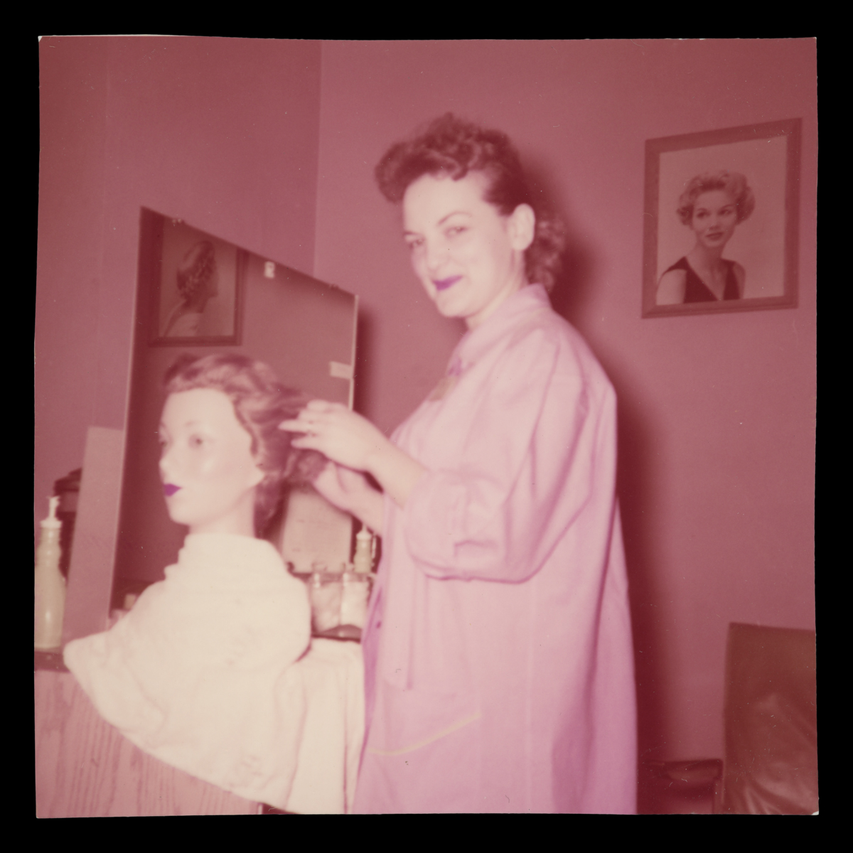 Velma Truant working on mannequin hair in New York