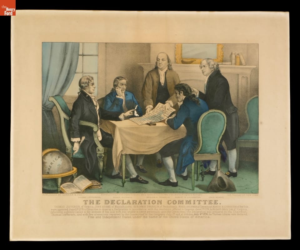 Engraving, Print of five men gathered around a table on which is a large document; also contains text