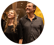 man-and-woman-near-train-circle Man and woman couple near museum train